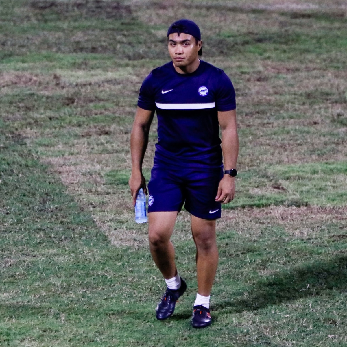 Coach Dzul coaching on the field